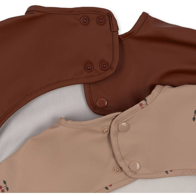 Konges Slojd Slabbetje Met Arrmen Cherry 30cm 2st - Konges Slojd - Babywinkel - 5712982725721