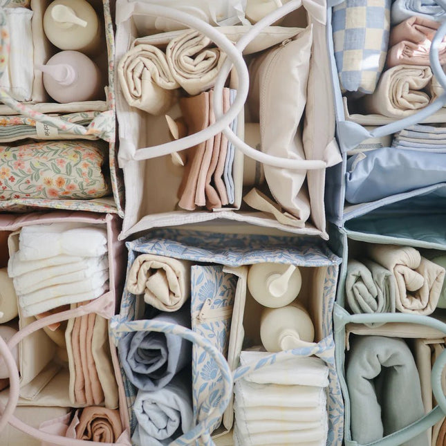 Mushie Draagbare Luier Organizer Pastel Blooms koop je bij Babywinkel