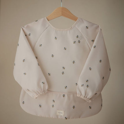 Mushie Long Sleeve Bib Bees koop je bij Babywinkel